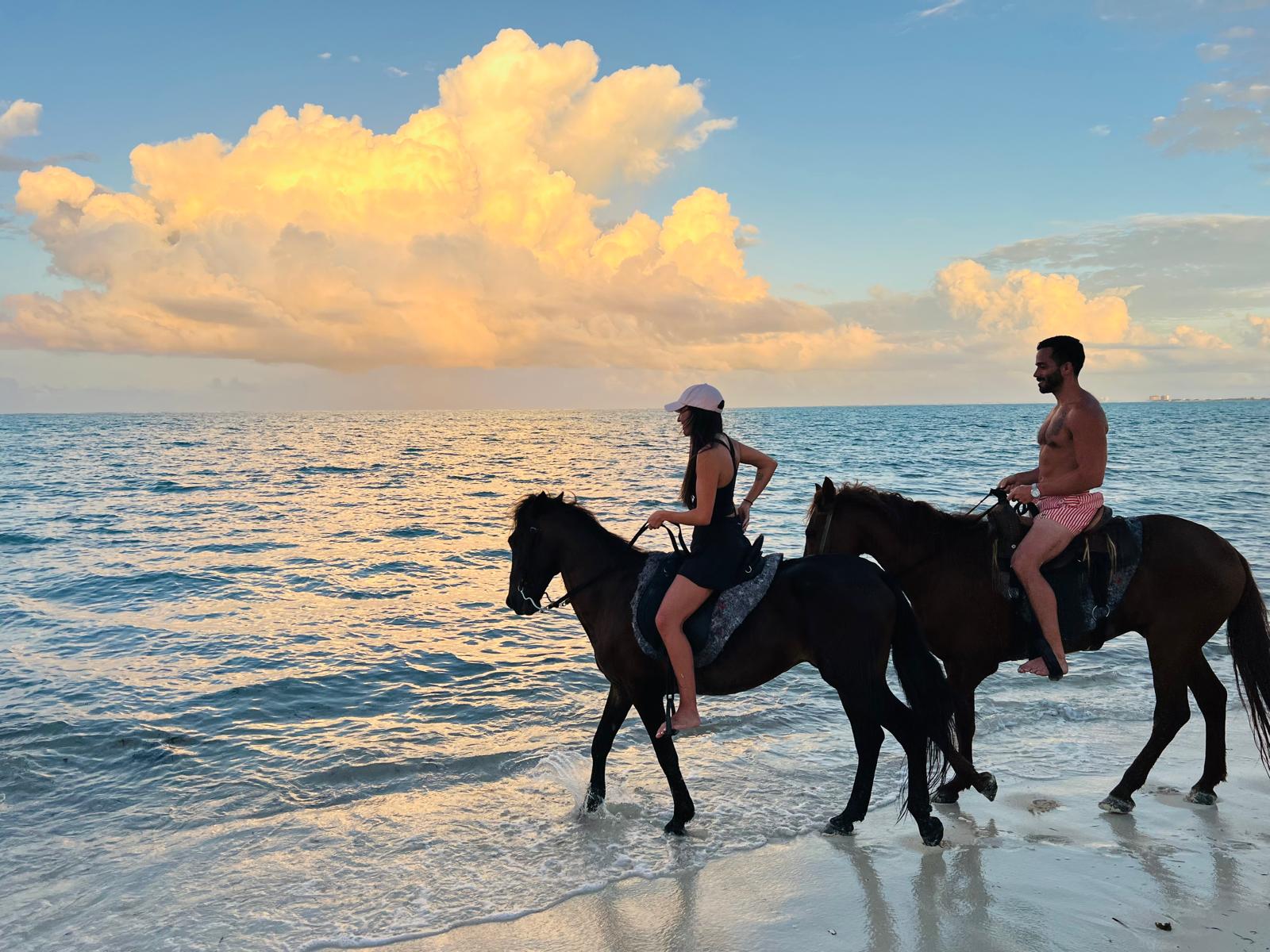 Sunset horseback riding on Grace Bay Beach